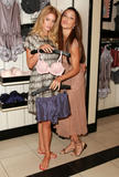 th_83813_Celebutopia-Doutzen_Kroes_and_Adriana_Lima_attend_Launch_of_Supermodel_Obsessions-07_122_131lo.jpg