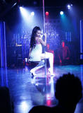 Roselyn Sanchez as an exotic dancer dances in lingerie around stripper pole