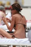 th_33962_Elisabetta_Canalis_in_bikini_on_beach_in_Miami_CU_ISA_050708_10_122_239lo.jpg