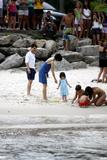 th_10178_Katie_Holmes4_Suri_and_Tom_Cruise_on_the_beach_in_Copa_Cabana_at_Sushi_place_CU_ISA_27_122_364lo.jpg