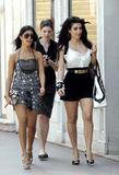 Kim Kardashian shows cleavage and legs walking in the streets in Monaco where she will attend the Monaco Television Festival
