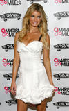 Marisa Miller shows cleavage in white dress as she hosts a party with Vans celebrating Vans by Marisa Miller in New York City