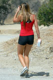 Amanda Bynes in red top and tight short pantis shows her ass and legs hiking at Runyon Canyon Park